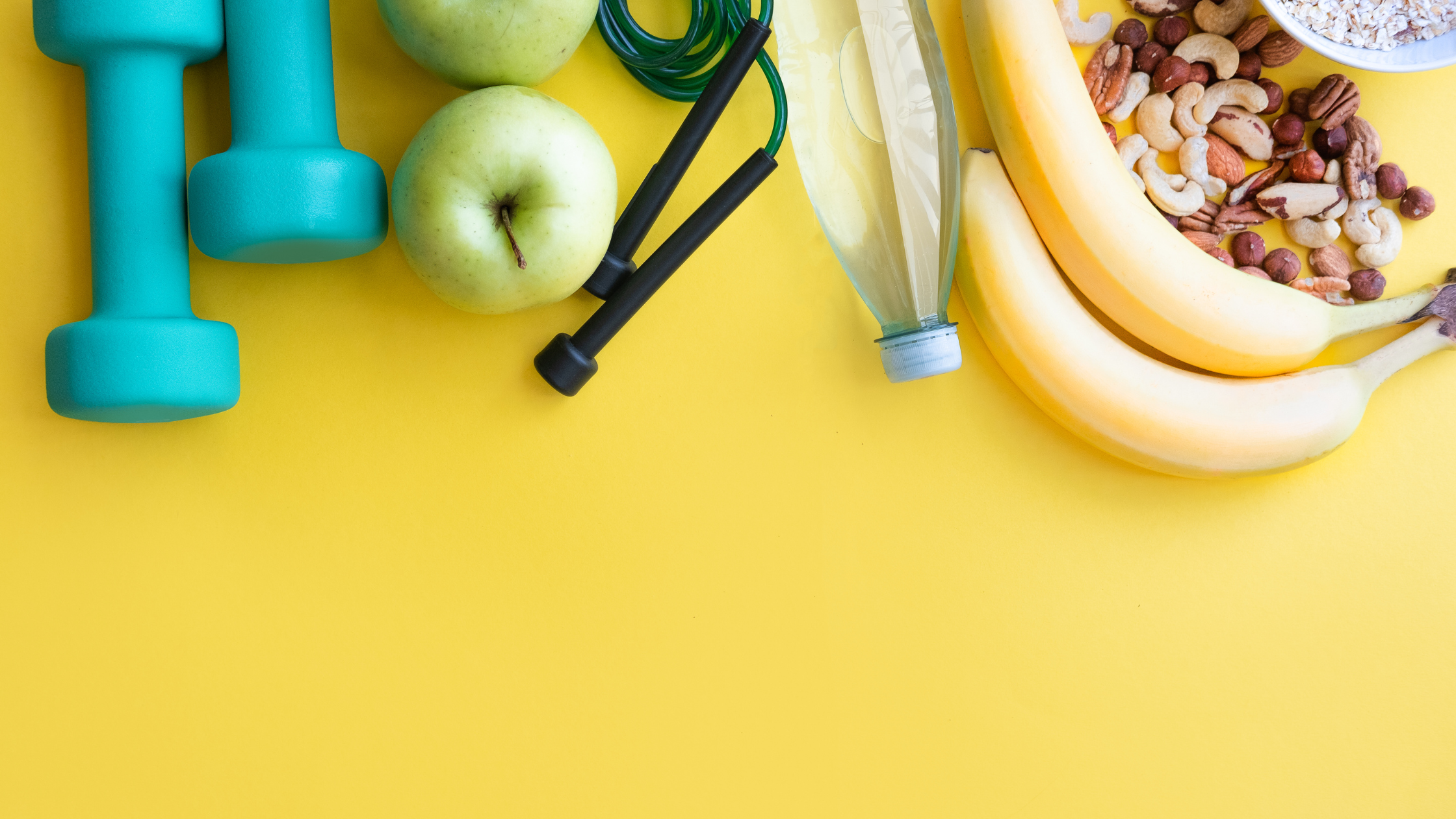 dumbbells, apple, water bottle, jump rope